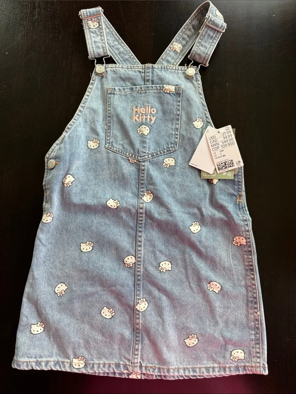 Hello Kitty Light Blue Denim Overall Dress with All-Over Kitty Faces - Picture 1 of 4
